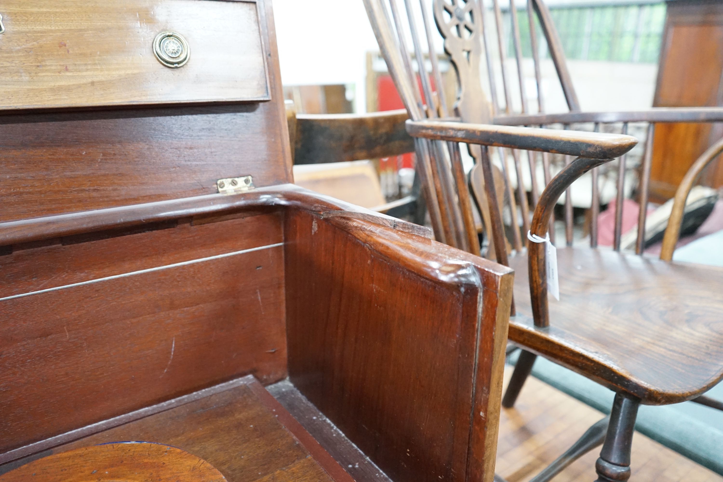 A George III mahogany hinged top commode with dummy drawer front and brass handles, width 66cm, depth 42cm, height 74cm